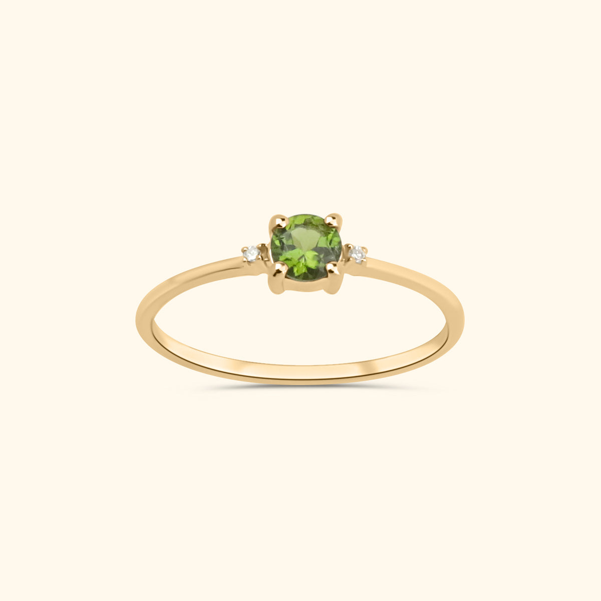 Fijne 9 karaat gouden damesring met ronde groene toermalijn en twee kleine diamantjes